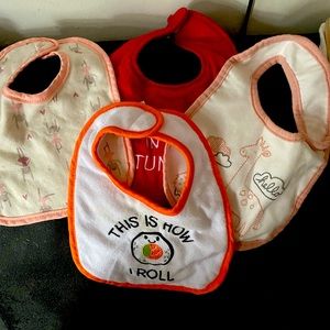 This bundle of 4 bibs and one hat all together
